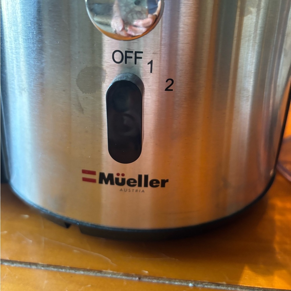 Juicer used once. No box or directions, but can google how to use it.